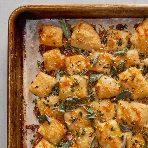 parmesan bread bites topped with sage and hot 
honey