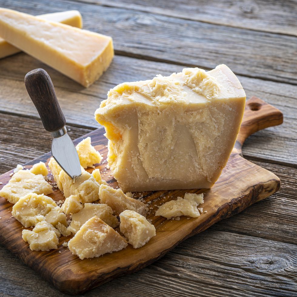parmesan reggiano cheese on cutting board