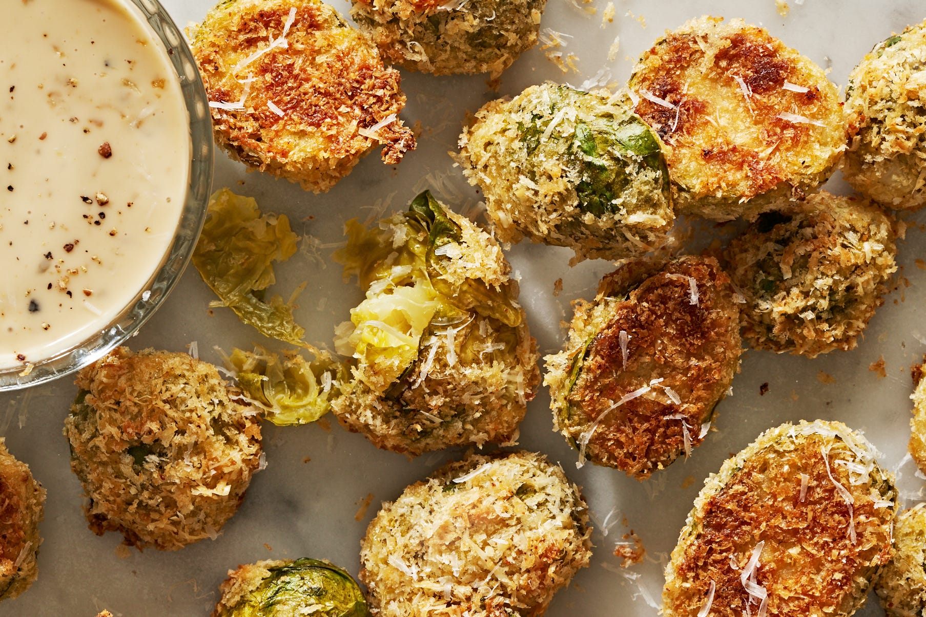 Parmesan Crusted Brussels Sprouts Are The Easiest, Cheesiest Side