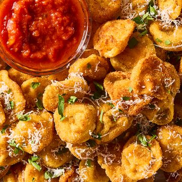fried bites of tortellini topped with parmesan and served with marinara sauce