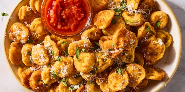 fried bites of tortellini topped with parmesan and served with marinara sauce