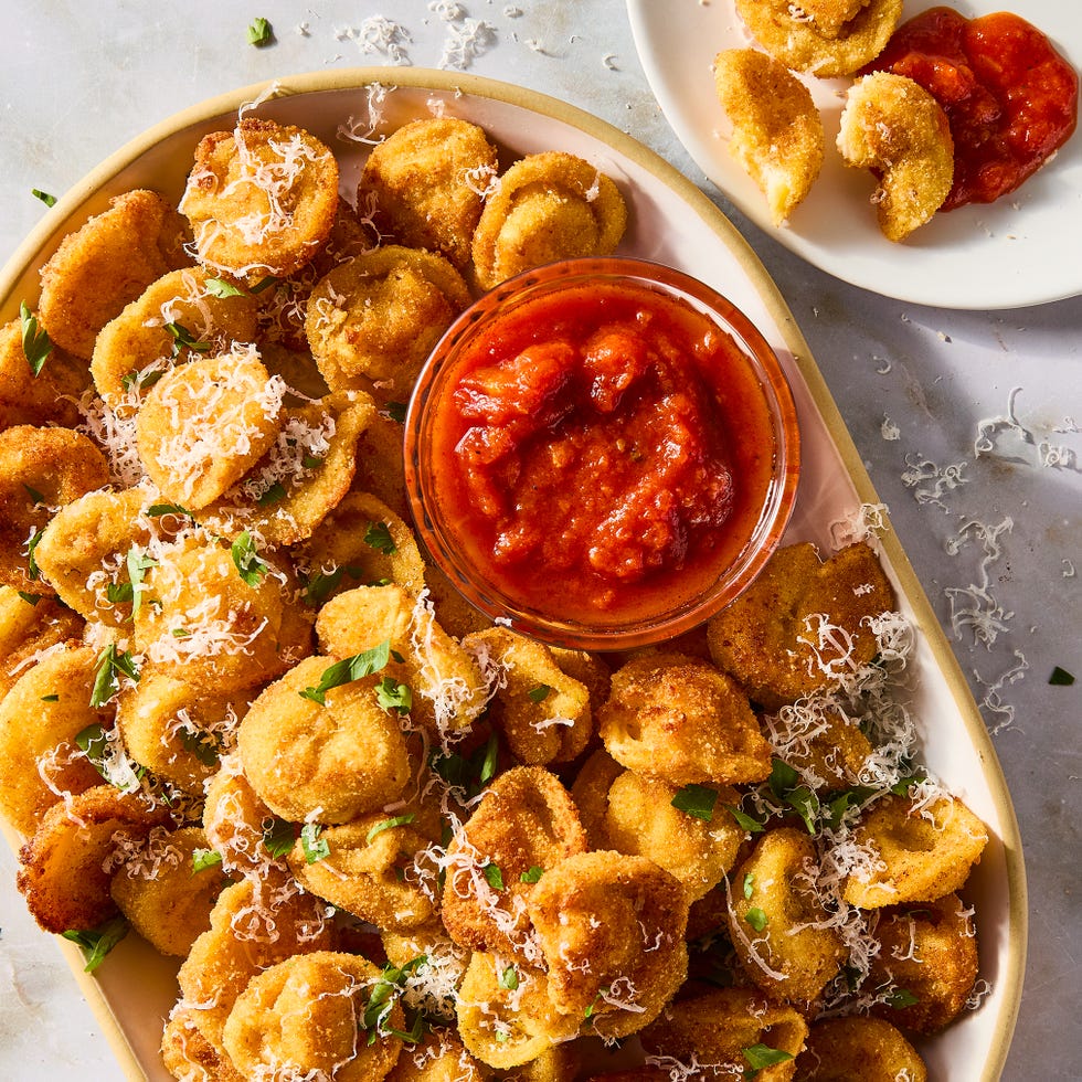 fried bites of tortellini topped with parmesan and served with marinara sauce