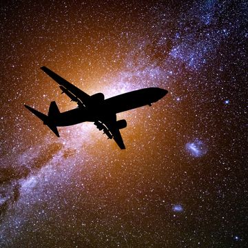 passenger plane against the background of the starry sky