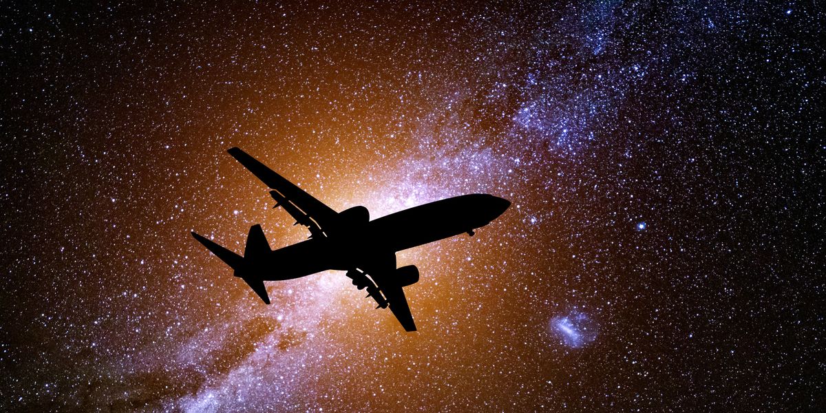 passenger plane against the background of the starry sky