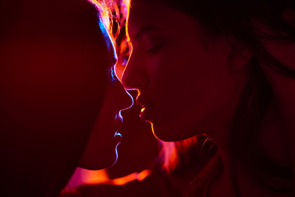 Passionate female kiss