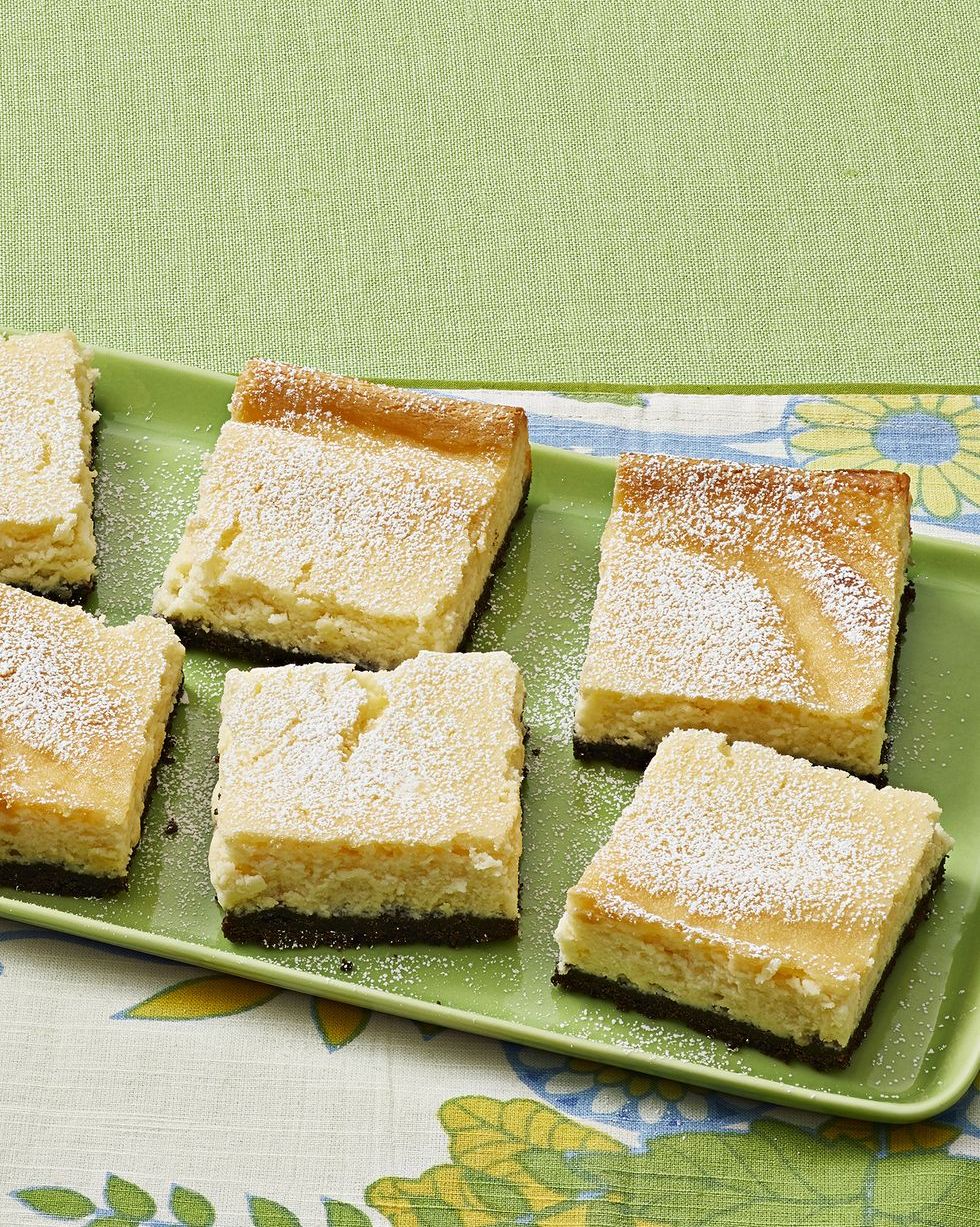 key lime pie cheesecake bars on green plate