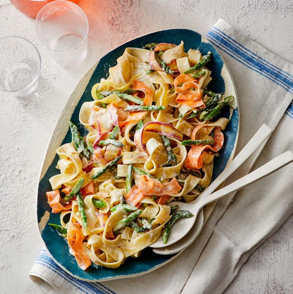 pasta primavera on a blue plate
