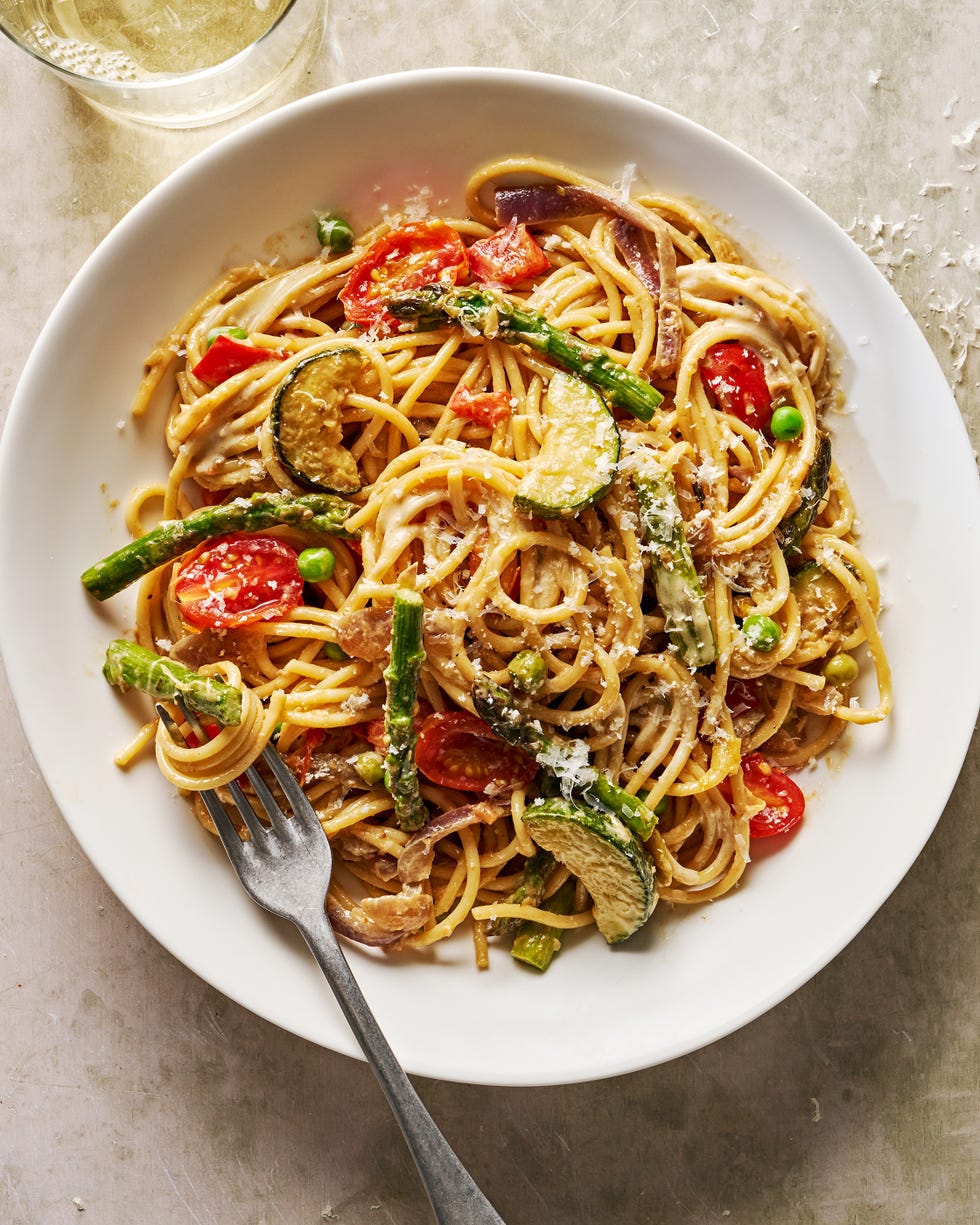 pasta primavera with zucchini asparagus onion leeks garlic tomato cream lemon parmesan