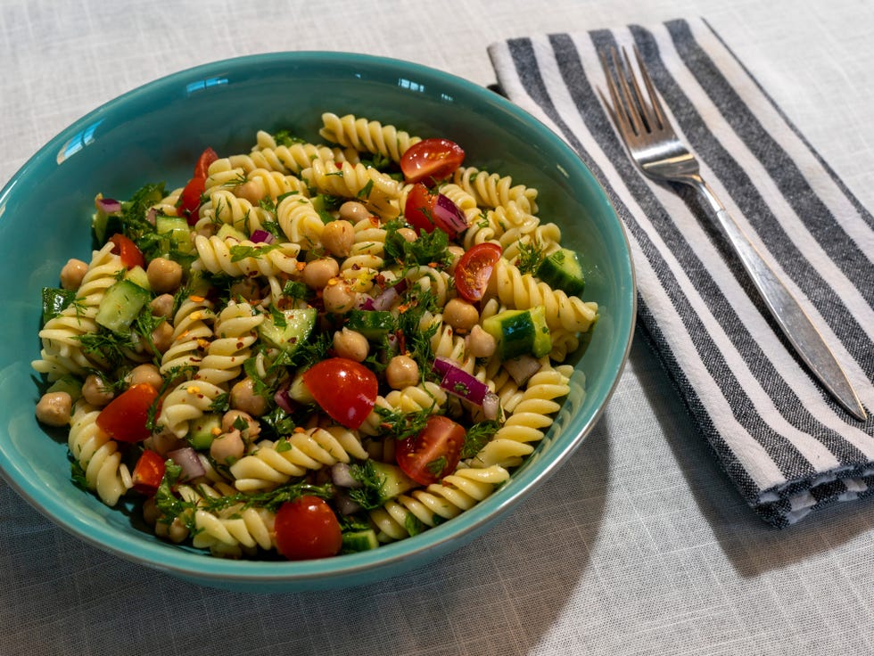 vegetable pasta salad with a place setting, easy pasta recipes