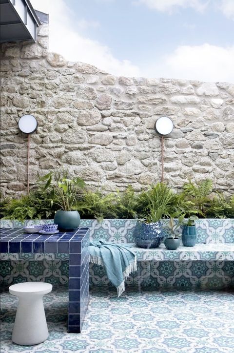 blue, water, wall, property, stone wall, architecture, room, furniture, design, rock,