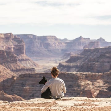 Wadi, Mountainous landforms, Badlands, Sky, Mountain, Sitting, Canyon, Landscape, Valley, Geology, 