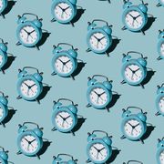 pattern of alarm clocks on a blue background