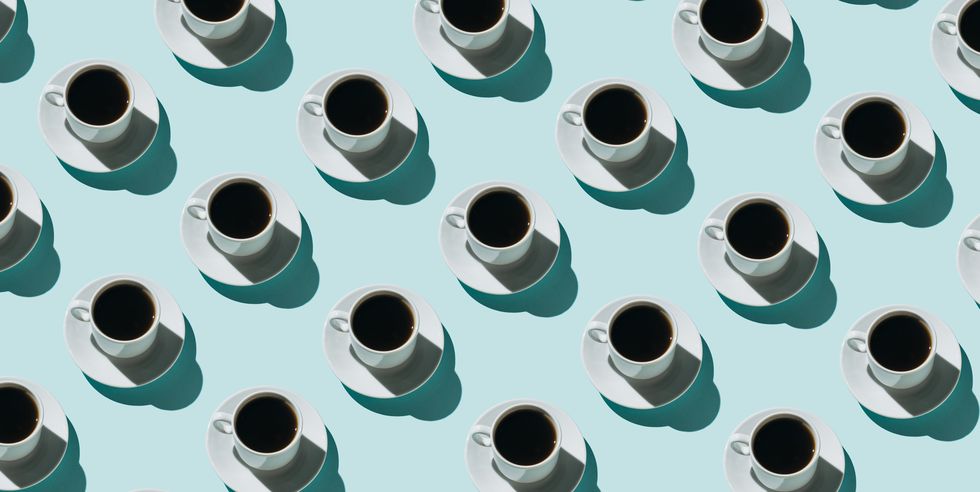 pattern of coffee cups on blue background