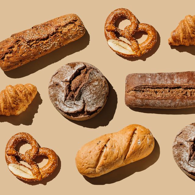 pattern of various bakery products handmade on beige background creative layout with bread, buns, croissant, bread loaves and pretzels modern minimal food photography collage in pop art style flat lay, top view