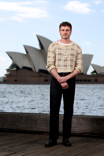 paul mescal standing in front of the syndey opera house