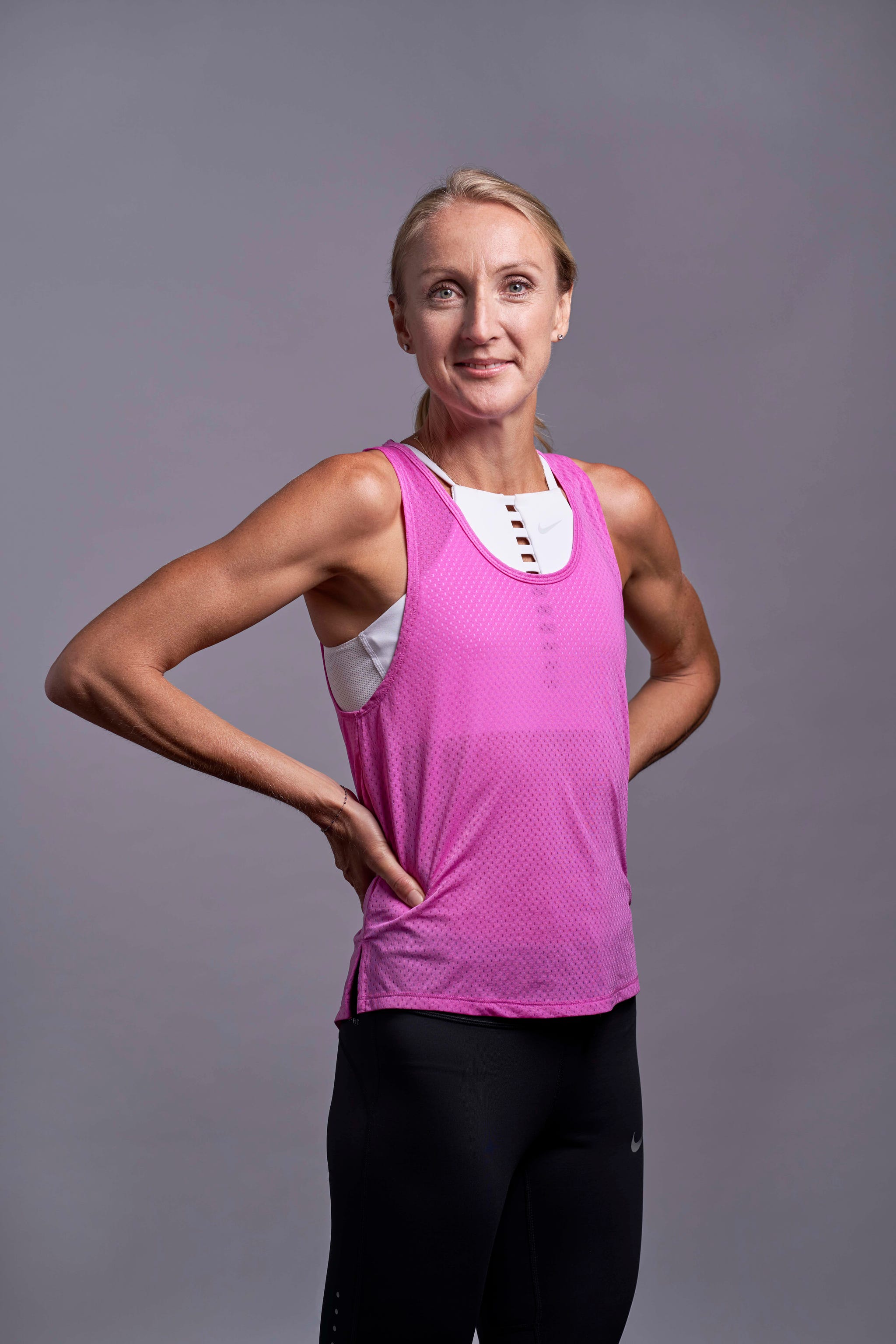 Clothing, Shoulder, Arm, Pink, Muscle, Physical fitness, Standing, Sportswear, Fitness professional, Joint, 