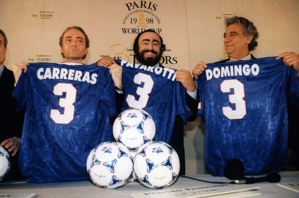 The Three Tenors holding soccer jerseys at the 1998 World Cup in Paris, France