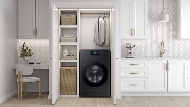 a sleek washer/dryer unit in a laundry nook