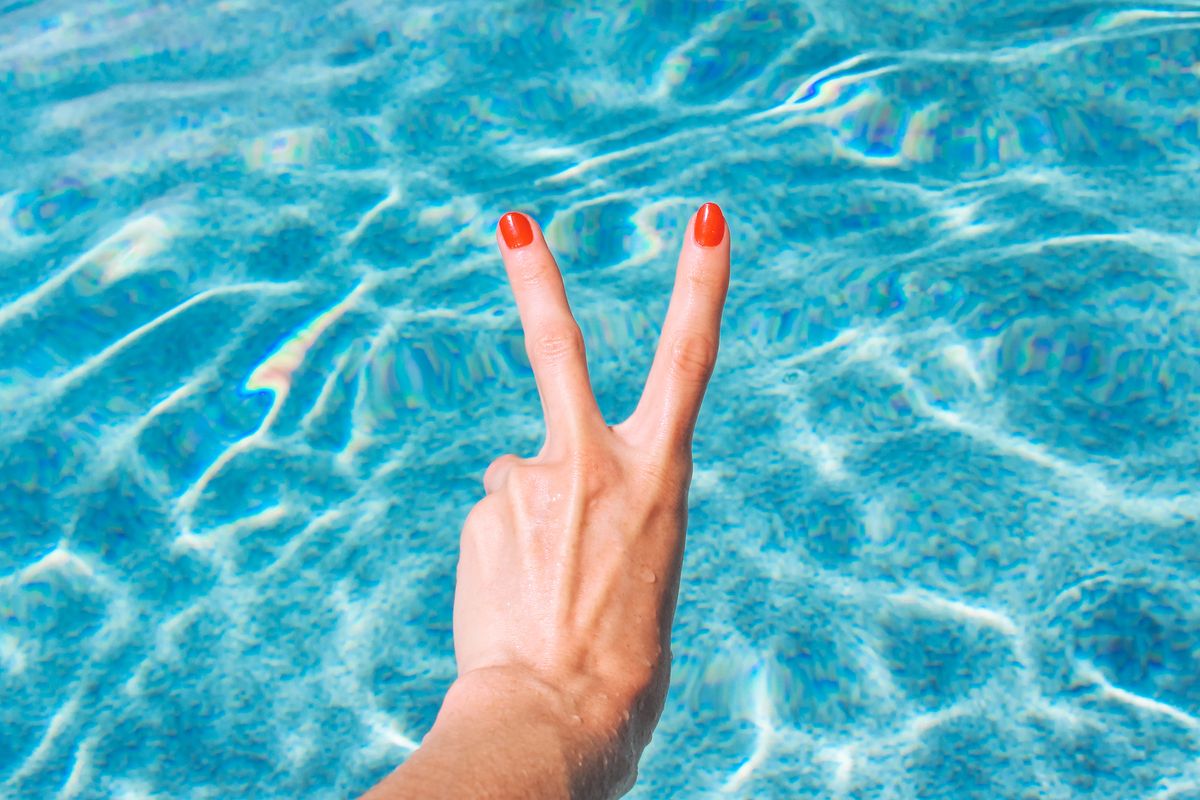 peace sign summer swimming pool tourist