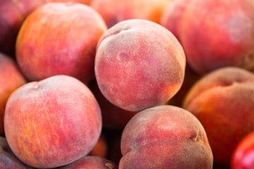 peaches seen displayed on the shelves of wroclaw market hall