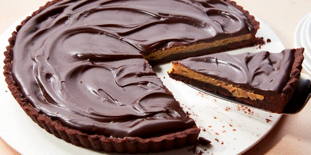 pie with a chocolate base, peanut butter filling, and chocolate top