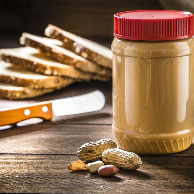 peanut butter jar on rustic wooden table