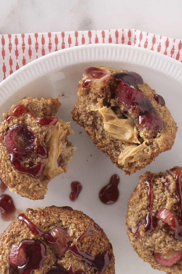peanut butter and jelly muffins on a white plate