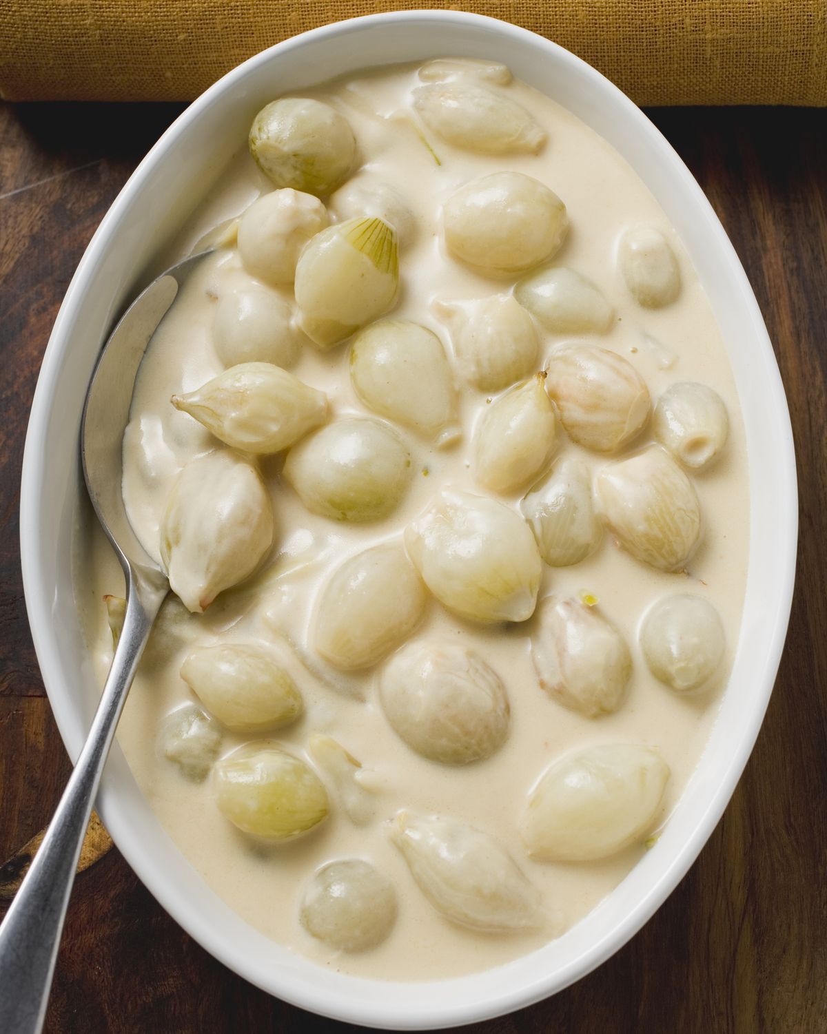 pearl onions in cream sauce, close up, overhead view