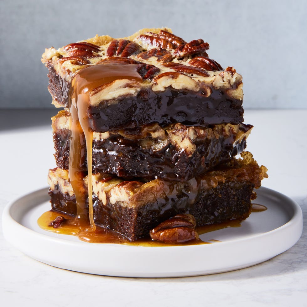 brownies with a pecan pie topping and caramel drizzle