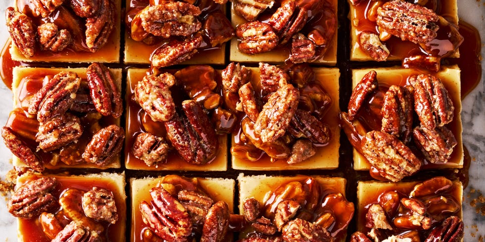 cheesecake bars topped with a pecan pie topping