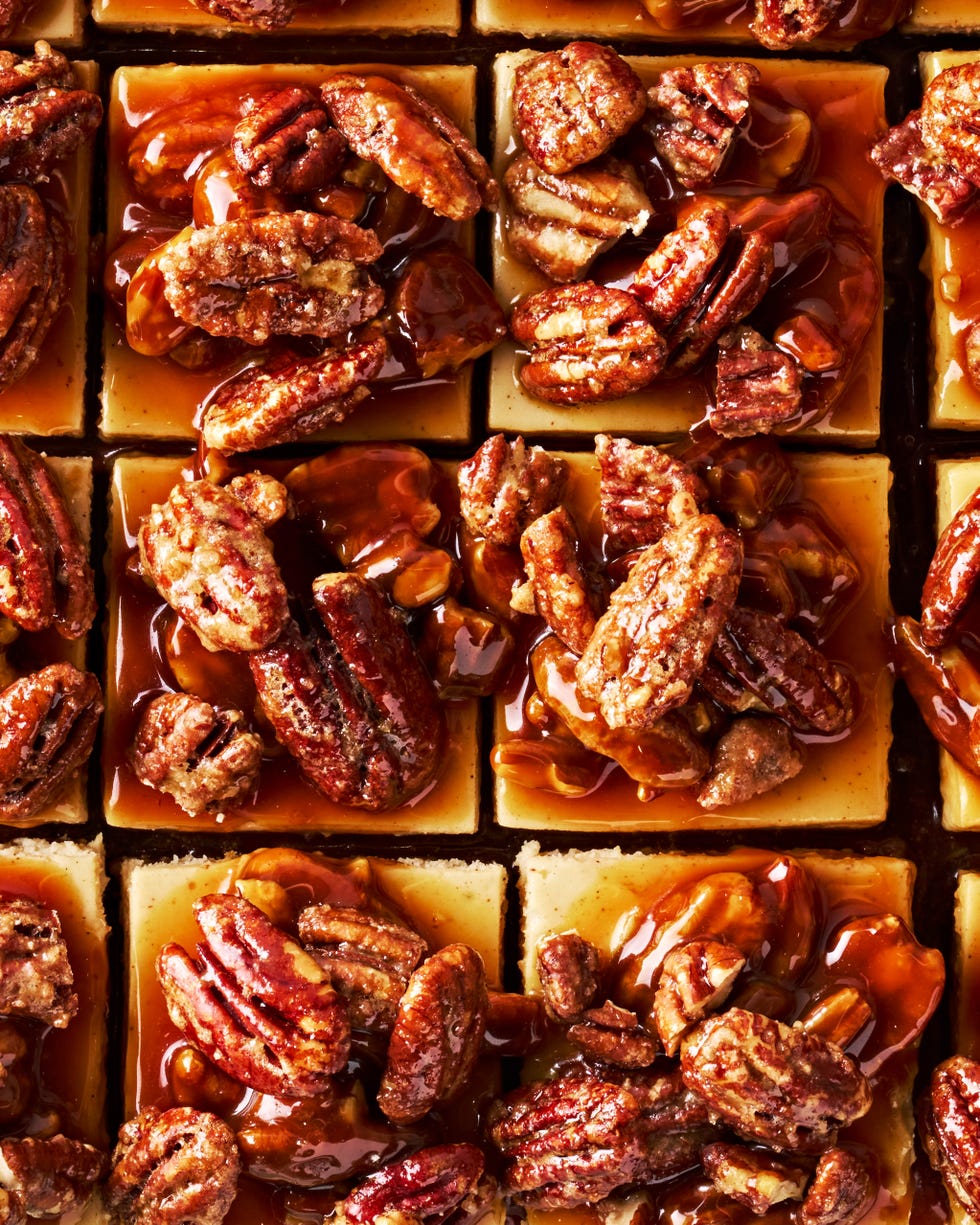 cheesecake bars topped with a pecan pie topping