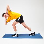 a split stance bow and rotate mat exercise