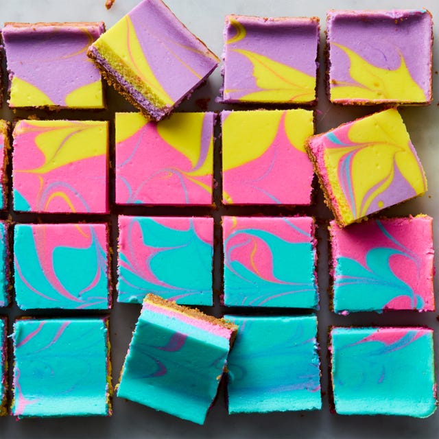 cheesecake bars swirled with yellow, purple, pink, and teal peeps colors cheesecake bars swirled with yellow, purple, pink, and teal peeps colors