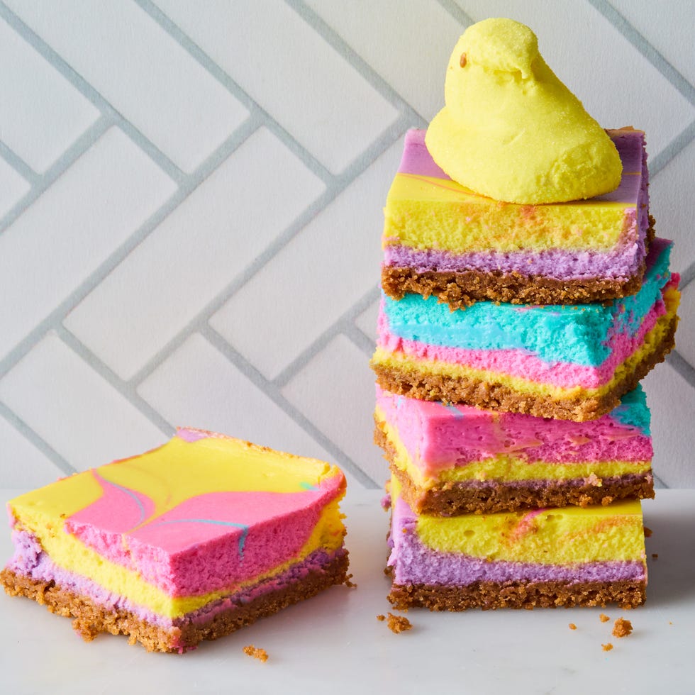 cheesecake bars swirled with yellow, purple, pink, and teal peeps colors