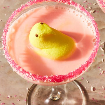 peeptini cocktail with yellow peep and sprinkle rim