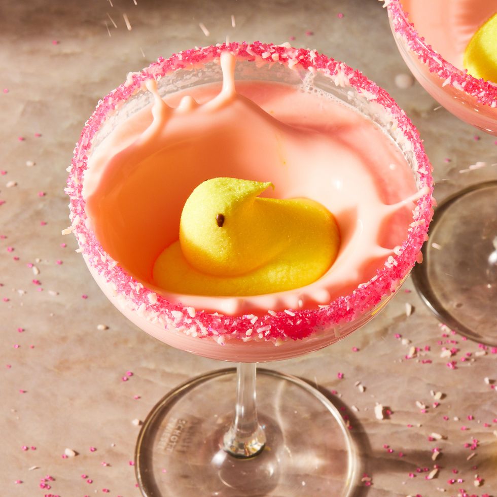 peeptini cocktail with yellow peep and sprinkle rim