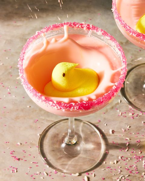 peeptini cocktail with yellow peep and sprinkle rim