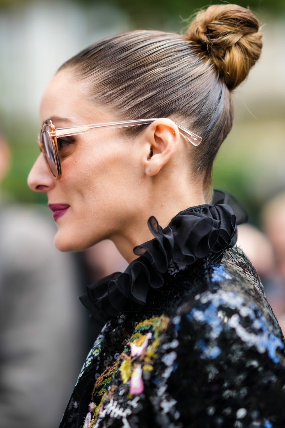 paris, france   october 04 olivia palermo wears sunglasses, a black ruffled collar shirt, a black  gold  pink  green sequined pattern jacket, outside the giambattista valli show, during paris fashion week   womenswear spring summer 2022, on october 04, 2021 in paris, france photo by edward berthelotgetty images
