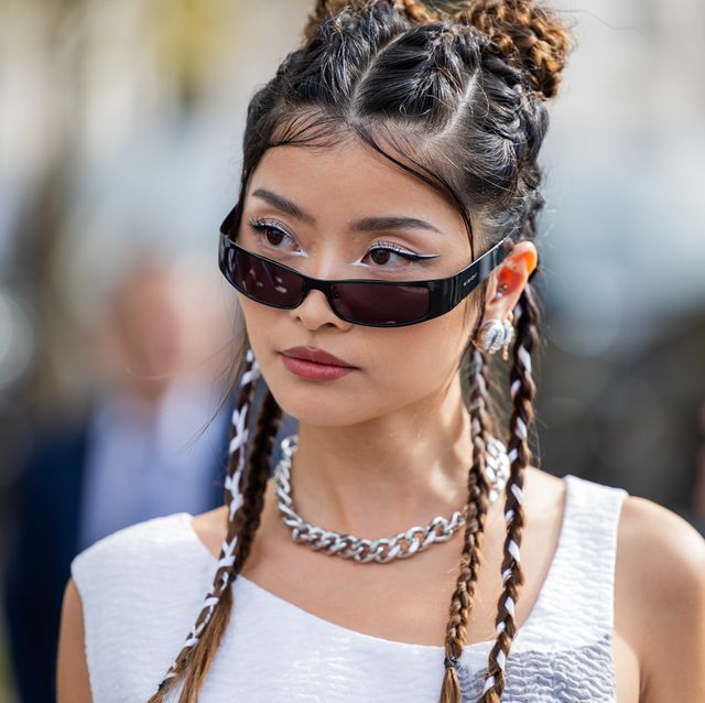 paris, france september 28 stephanie hui wears sunglasses, white dress outside givenchy during the womenswear springsummer 2024 as part of paris fashion week on september 28, 2023 in paris, france photo by christian vieriggetty images