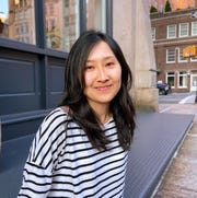 author jane pek in a striped shirt author jane pek in a striped shirt