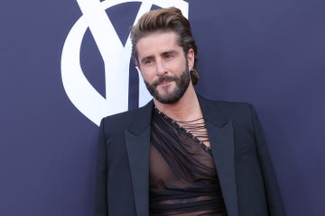 pelayo diaz en un photocall de la firma ysl