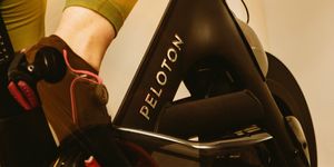 molly ritterbeck photographed in her apartment  in nyc in december 2020 riding her peloton bike