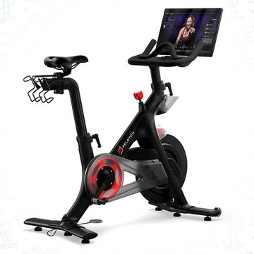peloton bike in all black with red accents