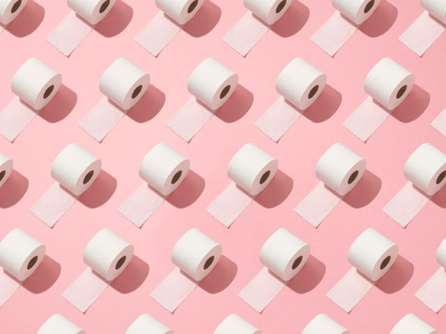 toilet rolls on pink background.
