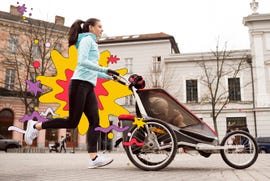 women running with baby in jogging stroller