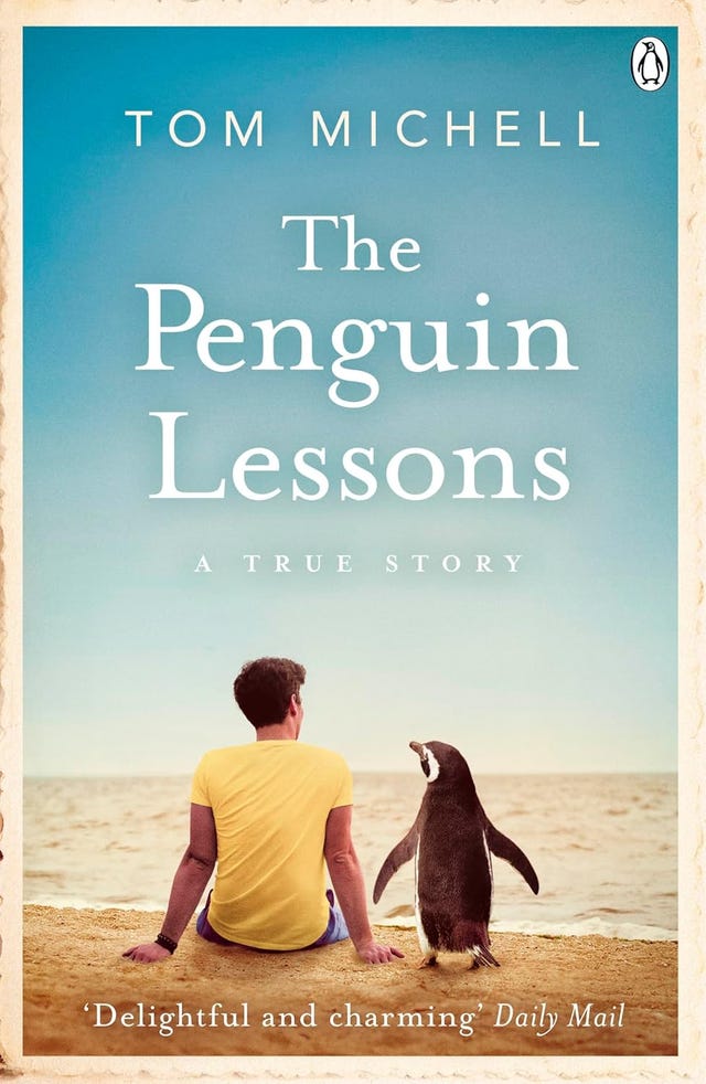 cover of the penguin lessons book featuring a young man and a penguin