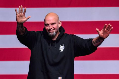 fetterman waves onstage at a watch party in ﻿pittsburgh, pa, during the midterm elections on november 8, 2022