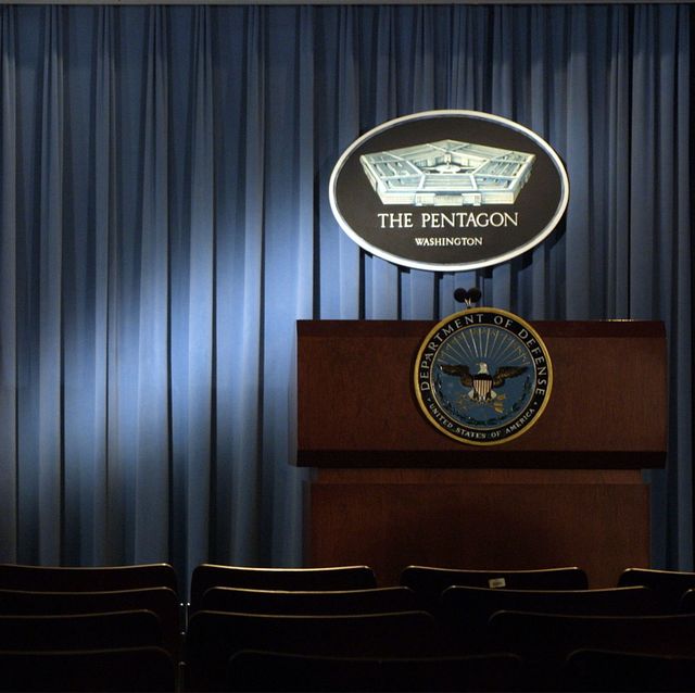 399192 06 the pentagon logo and an american flag are lit up january 3, 2002 in the briefing room of pentagon in arlington, va photo by alex wonggetty images