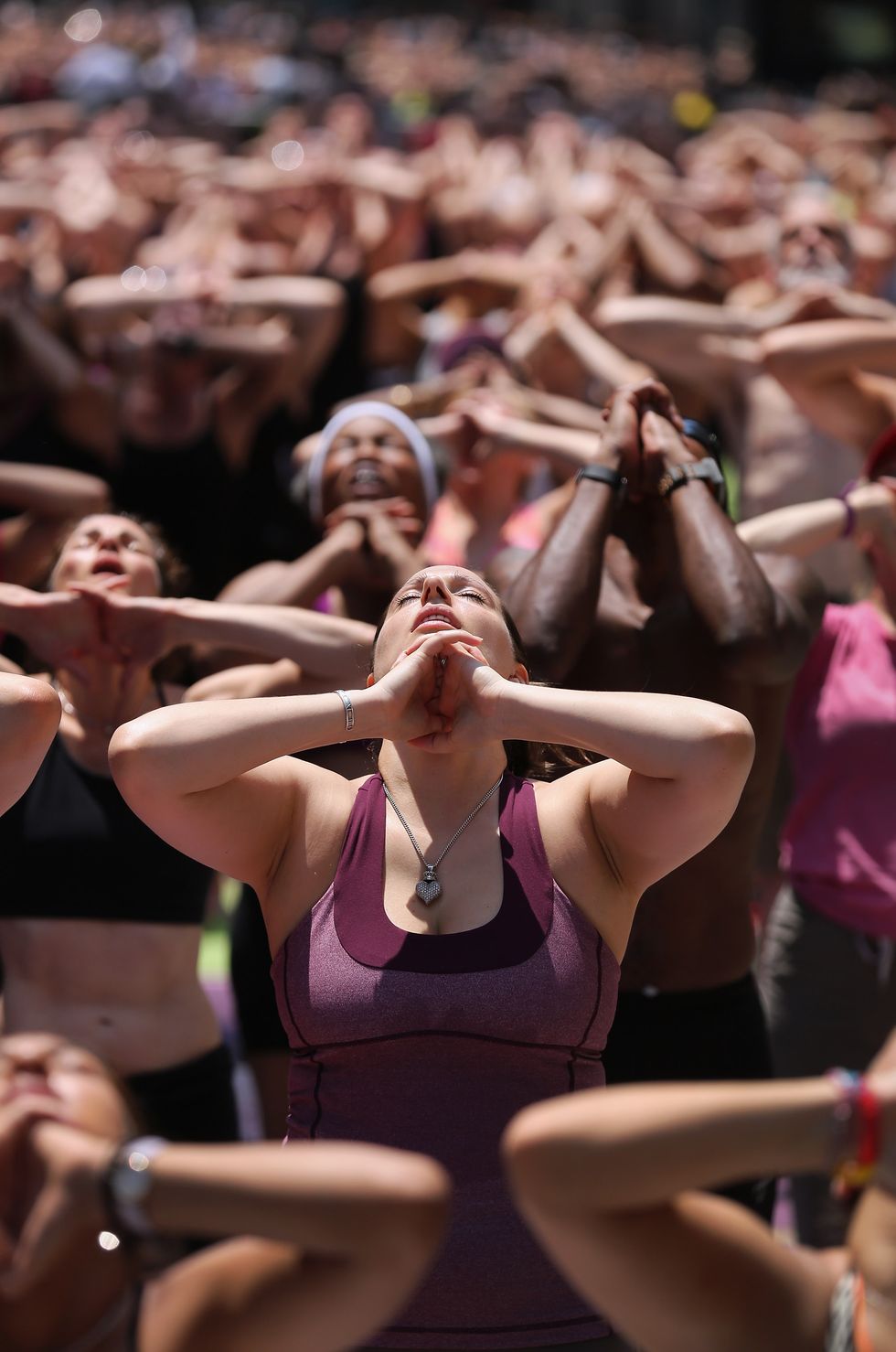 bikram yoga practicers at the annual mind over madness event in times square on june 20 2012