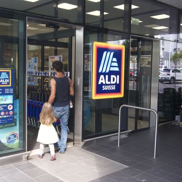 people entering aldi supermarket